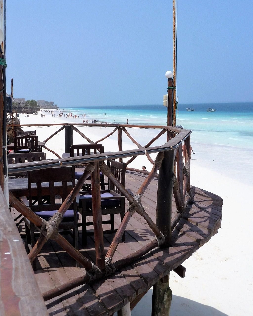 Zanzibar beach hotel deck overlooking clear ocean water